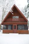 cottage in snow in winter